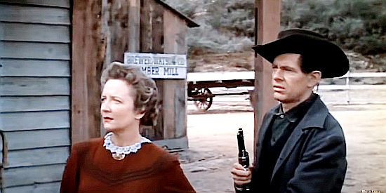 Margaret Campbell as Felicity Polk, concerned about her husband's safety in Gunslinger (1956)
