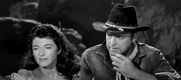 Margia Dean as Teresa Santos with Scott Brady as Sgt. Matt Blake in Ambush at Cimarron Pass (1958)