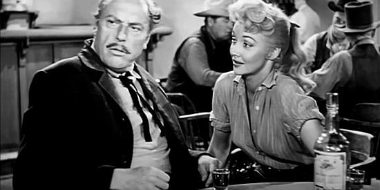 Mari Blanchard as Texas Rose, trying to work her feminie charm on Joseph Ryan (Howard Petrie) in The Return of Jack Slade (1958)