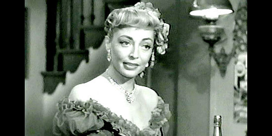 Marie Windsor as Bess Earle, pumping Kate Master's manager for information in Two-Gun Lady (1955)