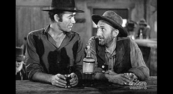 Mark Stevens as Jack Slade with Hollis (John Harmon), his helper in the freight business in Jack Slade (1953)