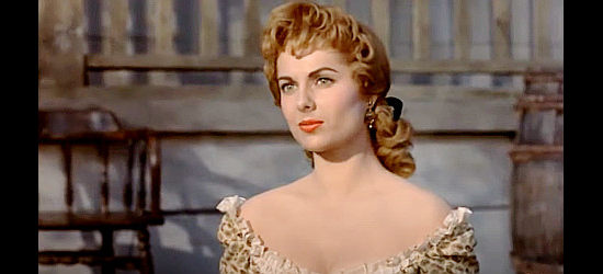 Martha Hyer as Brett McClain, getting her first glimpse of the new post commander Maj. Archer in The Battle of Rogue River (1954)