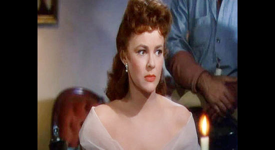 Mary Sinclair as Lela Wilson, torn between affection for Capt. North and love for Ed Bannon in Arrowhead (1953)