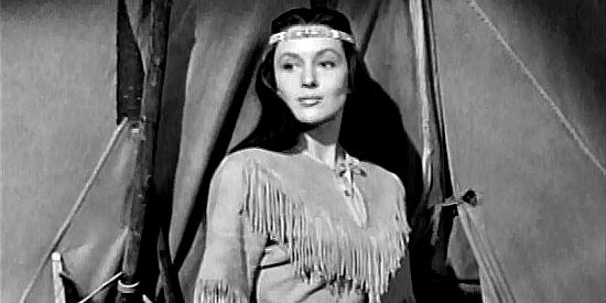 May Wynn as Ectay-O-Wahnee, realizing Bob Garth is kinder than most white ranchers in The White Squaw (1956)