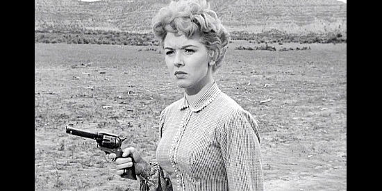 Merry Anders as Holly Dalton, forced into a life of crime after killing an undertaker who assaulted her in The Dalton Girls (1957)