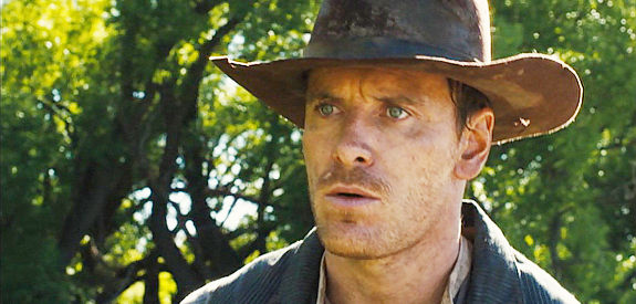Michael Fassbender as Silas Selleck, the man who offers to guide Jay to the forest known as Silver Ghost in Slow West (2015)