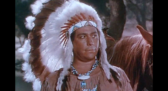 Michael Granger as Sitting Bull, trying to get Chief Crowfoot to join his war against the whites in Fort Vengeance (1953)
