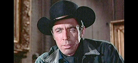 Michael Pate as Mace, the hired gun on Putnam's payroll to help stop the stages from rolling in Westbound (1959)