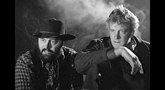Mickey Simpson as Jesse Clegg and James Arness as Floyd Clegg, two members of the outlaw gang in Wagon Master (1950)