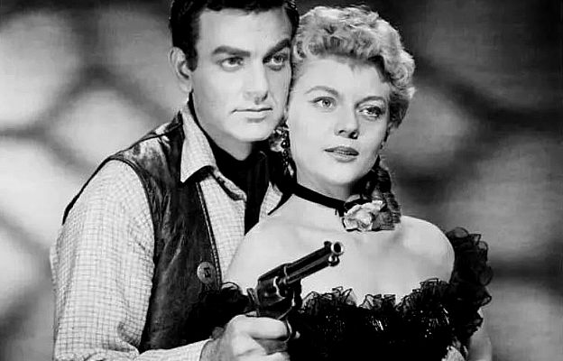 Mike Connors (aka Touch Connors) as Tom Blake, the man doing the dirty work for Maria 'Oklahoma' Saunders (Peggie Castle) in The Oklahoma Woman (1956)