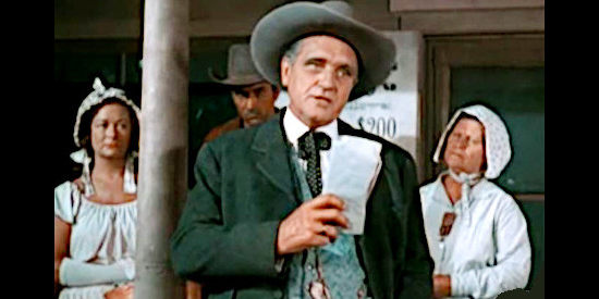 Morris Ankrum as Arthur Pickett, trying to convince the settlers to continue their journey West with his company in Fort Osage (1952)