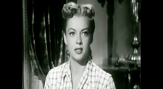 Myrna Dell as Norah Taylor, the domineering daughter of cattle king Artemus Taylor in The Bushwhackers (1952)