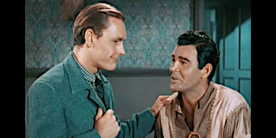 Myron Healey as Martin Christensen, telling Tom Clay (Rod Cameron) about the farm he hopes to establish in California in Fort Osage (1952)