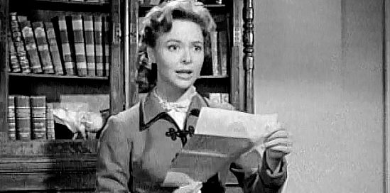Nancy Hale as Kerry Arnold, learning from her father's will that she has a half-Indian sister in The White Squaw (1956)