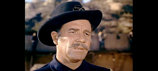 Onslow Stevens as Col. Walters, commander at Fort McCullough and a man besieged by Indian problems in They Rode West (1954)