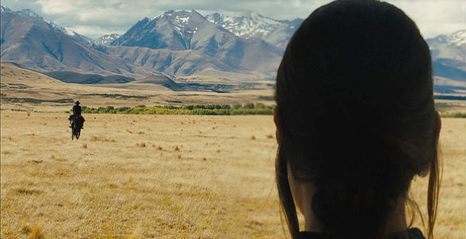 Caren Pistorius as Rose Ross spots an approaching rider in Slow West (2015)