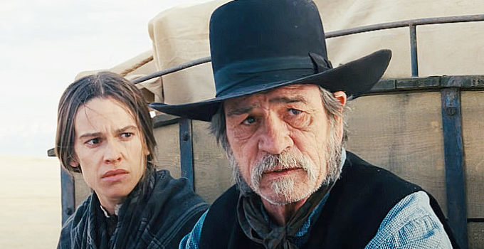 Hilary Swank as Mary Bee Cuddy with Tommy Lee Jones as George Briggs in The Homesman (2014)