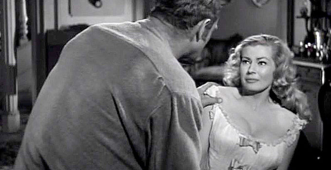 Anita Ekberg as Valerie, in the hands of sadistic husband John Garth in Valerie (1957)