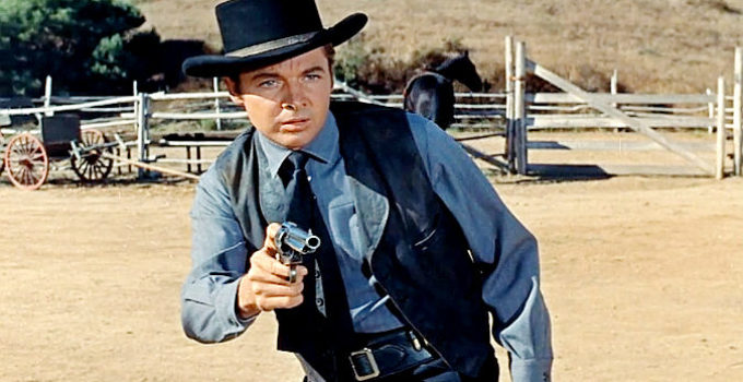 Audie Murphy as Joe Gant, the gunman who comes to Lordsburg and has a whole town worried about his target in No Name on the Bullet (1959)