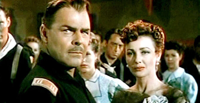 Brian Donlevy as Capt. Dempster and Virginia Grey as Lorabelle Larkin react when a young girl is taken captive by an outlaw in Slaughter Trail (1951).
