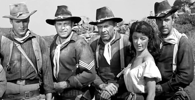 Clint Eastwood as Keith Williams, Scott Brady as Sgt. Blake, Margia Dean as Teresa Santos and Blake's men make a gruesome discovery in Ambush at Cimarron Pass (1958)