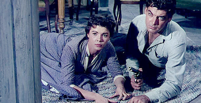 Colleen Miller as Lolly Bhumer and Rory Calhoun as Ray Cully in Four Guns to the Border (1954)
