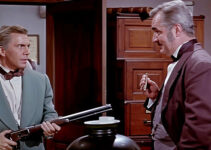 David Wayne as Tracy Powell, threatening Haver (Jim Backus) when he thinks he's been cheated again in The Naked Hills (1956)