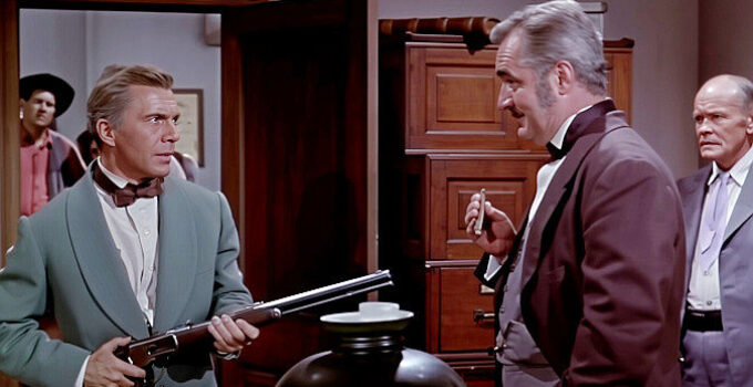 David Wayne as Tracy Powell, threatening Haver (Jim Backus) when he thinks he's been cheated again in The Naked Hills (1956)