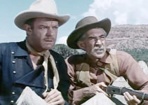 Dennis O'Keefe as Capt. Matt Riordan and Travor Bardette as Marshal Haney in Dragoon Wells Massacre (1957)