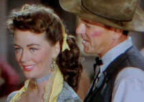 Dorothy Malone as Jeannie and Ronald Reagan as Frame Johnson in Law and Order (1953)