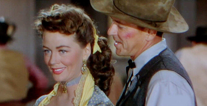 Dorothy Malone as Jeannie and Ronald Reagan as Frame Johnson in Law and Order (1953)