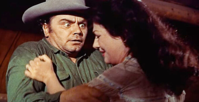 Ernest Borgnine as Shep Horgan, mad with jealousy over wife Mae (Valerie French) in Jubal (1956)