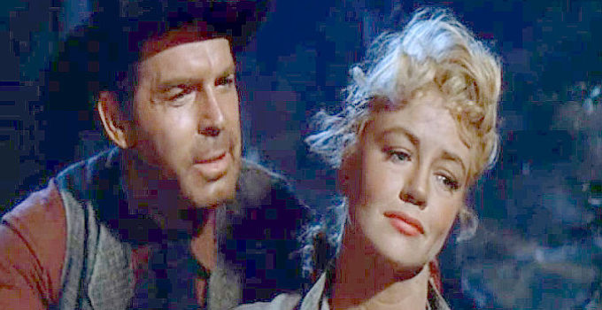 Fred MacMurray as Gentry and Dorothy Malone as Chaney, dreaming of a possible future in Quantez (1957)