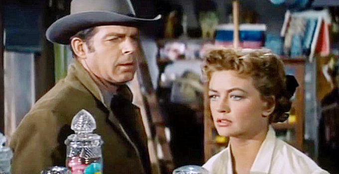 Fred MacMurray as Jack Wright with his wife Martha (Dorothy Malone) in At Gunpoint (1955)