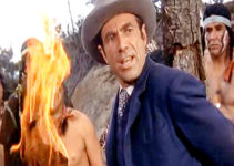 Gary Merrill as Brock Marsh, trying to talk his way out of being burned at the stake in The Black Dakotas (1954)