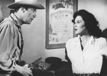 Gerald Mohr as Slinger and Patricia Medina as Angela in The Buckskin Lady (1957)