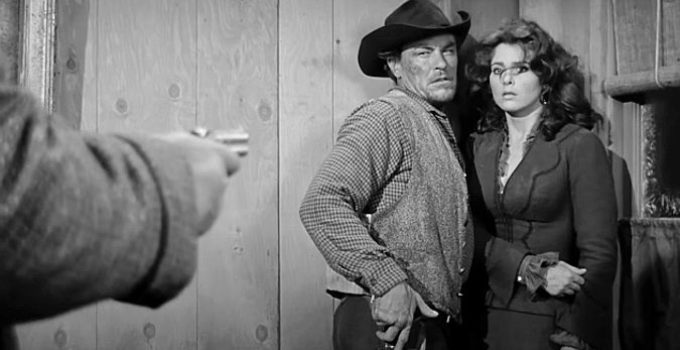 Jack Lambert as Tex harassing Helen Crane (Tina Louise) in Day of the Outlaw (1959)