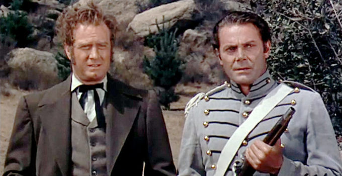 James Seay as Gov. Harrison and Jon Hall as Steve Ruddell, trying to keep the U.S. out of a war with the British in Brave Warrior (1952)