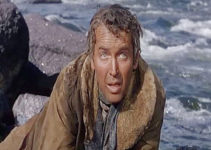 James Stewart as Howard Kemp, on the trail of a $5,000 bounty to buy back a ranch he lost in The Naked Spur (1953)