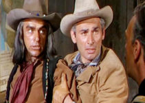 Jeff Chandler (middle) as Maj. Howell Brady, trying to calm Seminole leader Maygro (Henry Brandon) after the Army has broken a promise in War Arrow (1953)