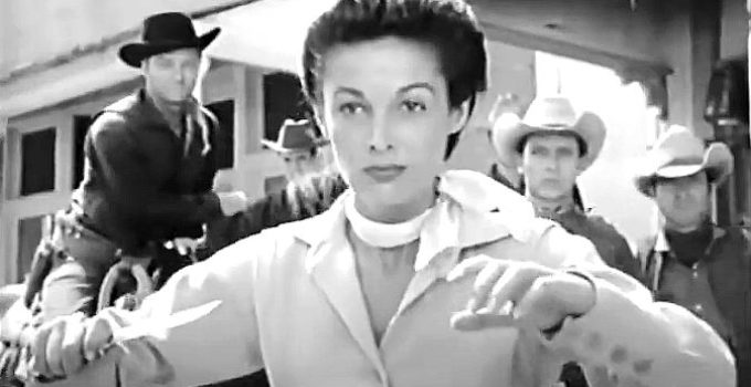 Joan Taylor as Anne LeBeau, ready to knife a man for calling her a dirty squaw in Apache Woman (1955)