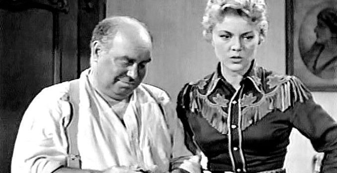 Joe Besser as Doc McGinnis with the trick shot artist he manages, Peggie Castle as Kate Masters in Two-Gun Lady (1955)