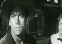 John Ireland as Jefferson Waring and Dorothy Malone as Cathy Sharpe in The Bushwhackers (1952)