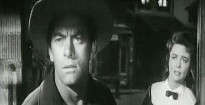 John Ireland as Jefferson Waring and Dorothy Malone as Cathy Sharpe in The Bushwhackers (1952)