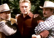Kirk Douglas as JIm Fallon, in trouble after one of his falling trees claims a life in The Big Trees (1952)