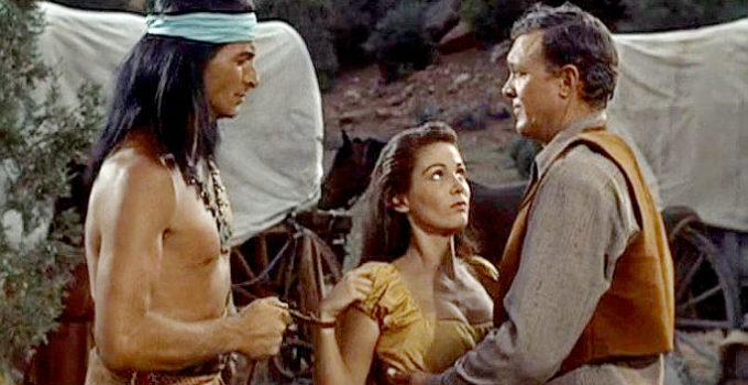 Lex Barker as Mangus reclaims his captive just as Riva (Joan Taylor) and Luke Fargo (Ben Johnson) were getting closer in War Drums (1957)