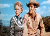 Peggie Castle as Ann Wilkins and Rod Cameron was wagon master Jeff Curtis in Wagons West (1952)