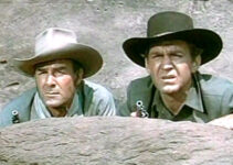 Randolph Scott as Andrew Barclay and Forrest Tucker as Tom Tanner in The Nevadan (1950)