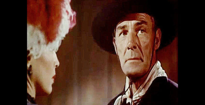 Randolph Scott as Jim Kipp, a bounty hunter who arrives in Twin Foks looking for three thieves in The Bounty Hunter (1954)