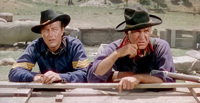 Ray Milland as Ken Shafter and Forrest Tucker as Donavan, awaiting another charge by the SIoux in Bugles in the Afternoon (1952)